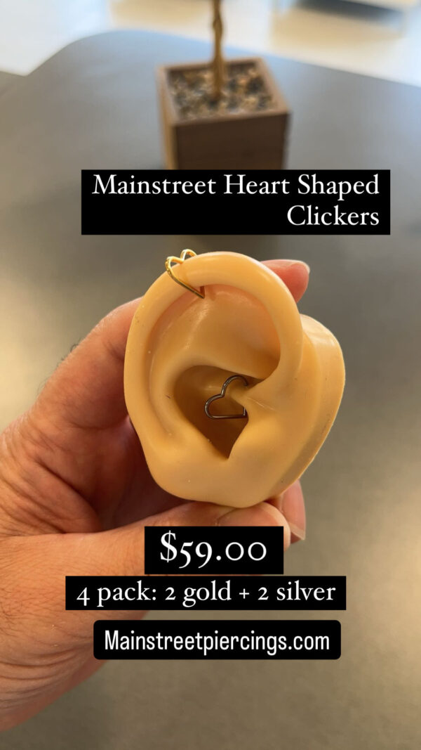 A person holding an ear with a price tag of $ 5 9.